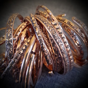 Making copper patterned rings in our sacred NZ factory