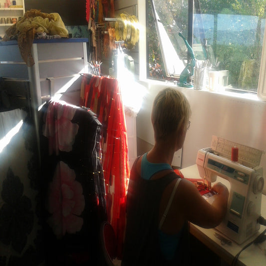 Nita making sarongs in our sacred nz factory